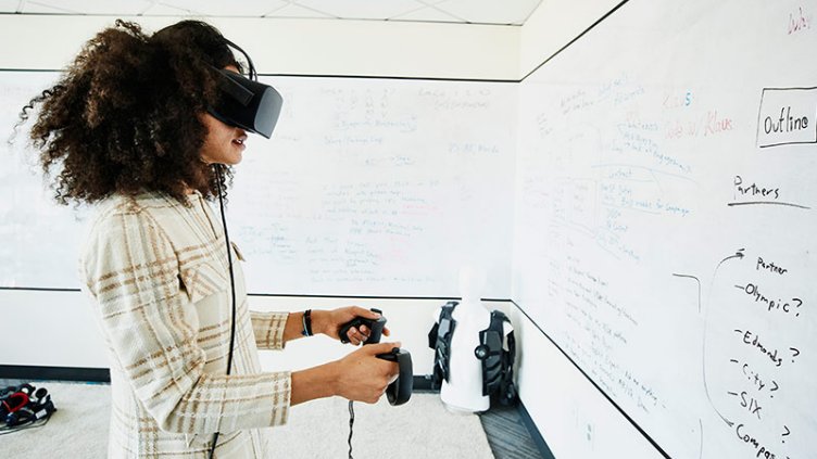 Women wearing virtual reality headset