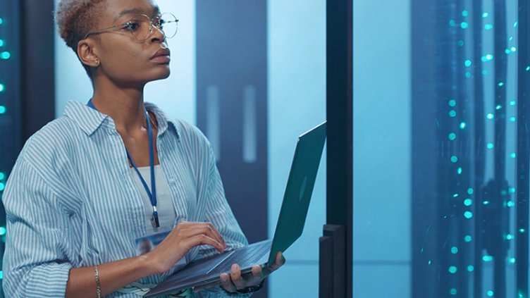 Woman working in data center