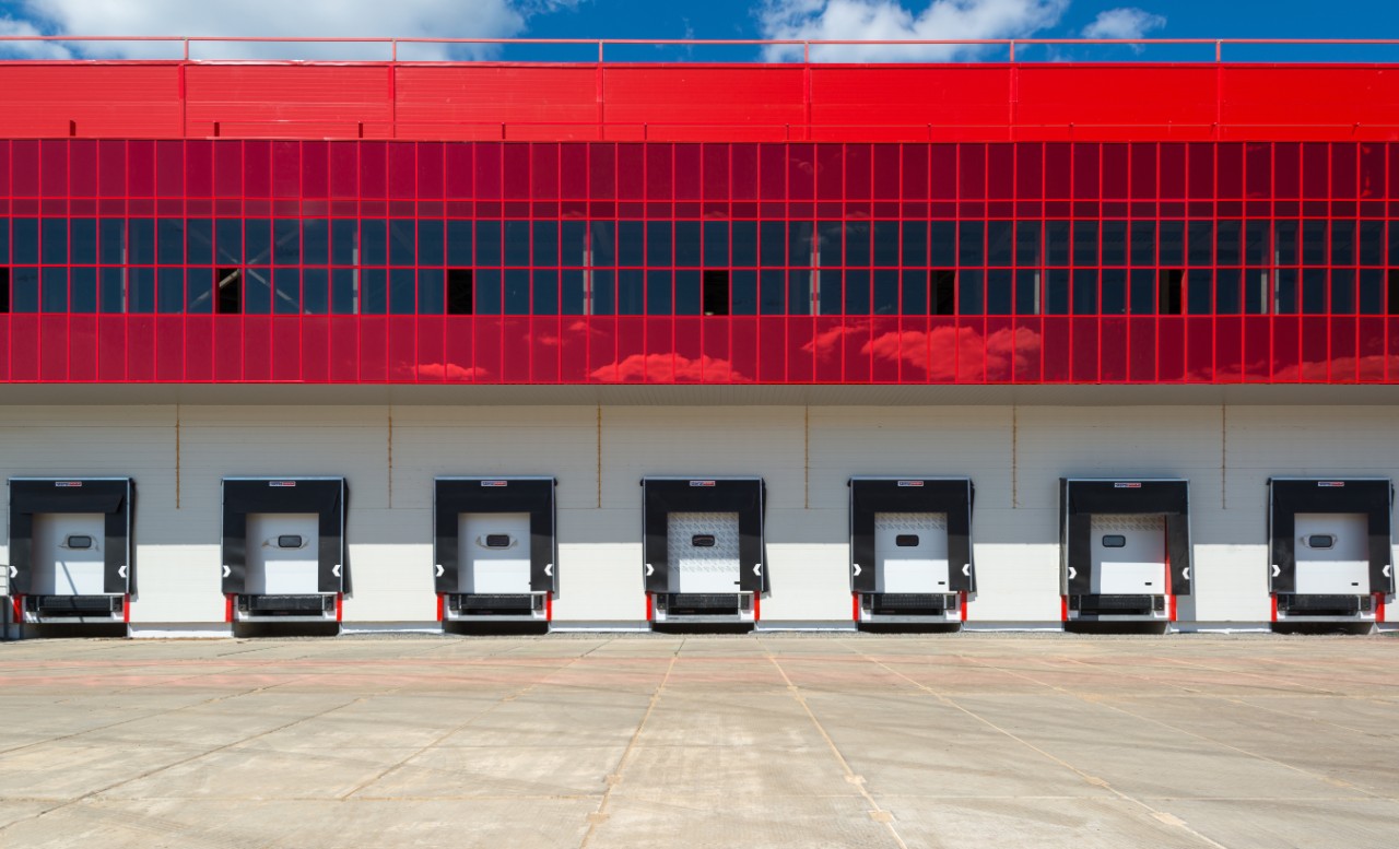 Front view of loading docks of modern warehouse