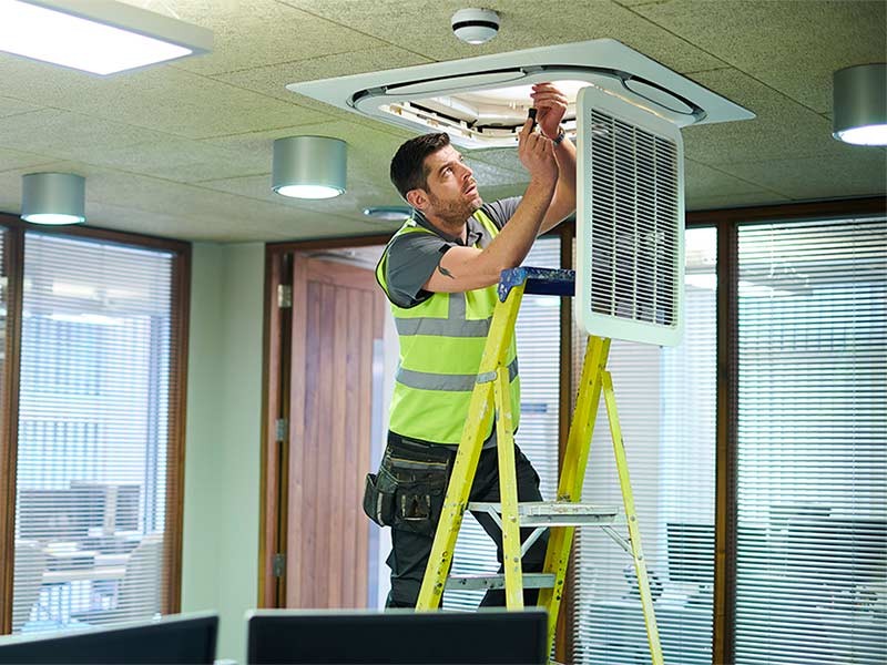 Man working on ventilation shaft